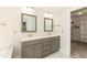 Double vanity bathroom with gray cabinets and marble countertops at 159 Shady Oaks Dr, Benson, NC 27504