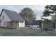 Modern farmhouse with detached garage and landscaping at 109 Jones Ave, Hillsborough, NC 27278