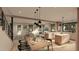 Open concept kitchen and dining area with island and modern lighting at 109 Jones Ave, Hillsborough, NC 27278