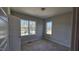 Bright bedroom with large window and neutral walls at 95 Weathered Oak Way, Youngsville, NC 27596