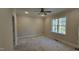 Spacious bedroom with large window and ceiling fan at 95 Weathered Oak Way, Youngsville, NC 27596