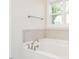 Bathroom with soaking tub and tile surround at 2074 Burch Bridge Rd, Burlington, NC 27217