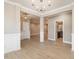 Open dining room with views into kitchen and living room at 2074 Burch Bridge Rd, Burlington, NC 27217