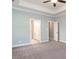 Spacious main bedroom with carpet and ensuite bathroom access at 2074 Burch Bridge Rd, Burlington, NC 27217