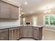 Kitchen with island, stainless steel appliances, and granite countertops at 2074 Burch Bridge Rd, Burlington, NC 27217