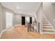 Bright hallway with hardwood floors and modern barn doors at 5406 Garrett Rd, Durham, NC 27707