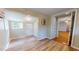 Laundry and back entry with vinyl flooring and storage at 5141 Nc 56, Franklinton, NC 27525