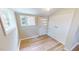 Laundry room with vinyl flooring and built-in storage at 5141 Nc 56, Franklinton, NC 27525