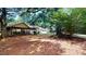 Spacious backyard with a shed and covered patio at 5141 Nc 56, Franklinton, NC 27525