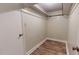 Large closet with wood flooring and double hanging rods at 5141 Nc 56, Franklinton, NC 27525