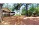 Large backyard with mature trees at 5141 Nc 56, Franklinton, NC 27525