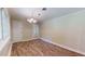 Bright dining room with hardwood floors and french doors at 5141 Nc 56, Franklinton, NC 27525