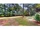 Large backyard with mature trees at 5141 Nc 56, Franklinton, NC 27525