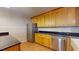 Stainless steel appliances and wood cabinets in kitchen at 5141 Nc 56, Franklinton, NC 27525