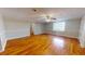 Hardwood floor living room with access to upper level at 5141 Nc 56, Franklinton, NC 27525