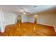 Hardwood floor living room with neutral walls and ceiling fan at 5141 Nc 56, Franklinton, NC 27525