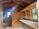 Shed interior with shelves and workbench at 5141 Nc 56, Franklinton, NC 27525
