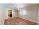Dining room features hardwood floors and kitchen access at 5141 Nc 56, Franklinton, NC 27525
