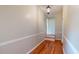 Hallway with hardwood floors and neutral walls at 5141 Nc 56, Franklinton, NC 27525