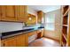 Kitchen boasts ample cabinetry and workspace with granite countertops at 5141 Nc 56, Franklinton, NC 27525