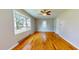Spacious living room with hardwood floors and bay window at 5141 Nc 56, Franklinton, NC 27525