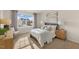 Spacious bedroom with large window and neutral decor at 6421 Alfalfa Ln, Wake Forest, NC 27587