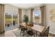 Bright dining room with sliding glass door leading to patio at 6421 Alfalfa Ln, Wake Forest, NC 27587