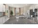 Modern kitchen with granite countertops and stainless steel appliances at 6421 Alfalfa Ln, Wake Forest, NC 27587