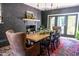 Black brick fireplace in the dining room at 615 Beaver Creek Rd, Apex, NC 27502