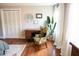 Bedroom featuring hardwood floors, built-in closet, and a writing desk at 615 Beaver Creek Rd, Apex, NC 27502