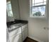 Clean bathroom with granite vanity and a single sink at 80 Lotus Ave, Smithfield, NC 27577