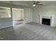 Spacious living room with a fireplace and carpet at 80 Lotus Ave, Smithfield, NC 27577