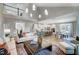 Two-story living room with open floor plan, hardwood floors, and a view to the kitchen at 170 Aberdeen, Rocky Mount, NC 27804