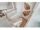 Open staircase with wood railings, leading to upper level at 170 Aberdeen, Rocky Mount, NC 27804
