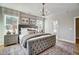Spacious bedroom with tufted headboard, window seat, and decorative accents at 170 Aberdeen, Rocky Mount, NC 27804