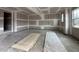 Unfinished garage space with drywall and concrete floor at 25 Chestnut Oak Dr, Youngsville, NC 27596