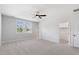 Large bedroom with ceiling fan and walk-in closet at 8416 Brady Pointe Rd, Fuquay Varina, NC 27526