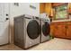 Laundry room with washer, dryer, and cabinets at 1502 Bahama Rd, Bahama, NC 27503