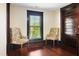 Small sitting area with two chairs and a window at 1502 Bahama Rd, Bahama, NC 27503