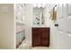 Bathroom with a wood vanity and a shower at 1502 Bahama Rd, Bahama, NC 27503