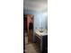 View of a bathroom with a vanity and closet at 4907 Hollenden Dr # 106, Raleigh, NC 27616