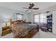 Spacious bedroom with king-size bed and ceiling fan at 8428 Nc 39 Highway, Middlesex, NC 27557
