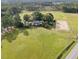 Aerial view of house on large lot with riding arena at 8428 Nc 39 Highway, Middlesex, NC 27557