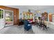 Cozy dining area with wood floors and vintage furniture at 8428 Nc 39 Highway, Middlesex, NC 27557