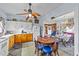 Bright kitchen with wood cabinets and a dining area at 8428 Nc 39 Highway, Middlesex, NC 27557