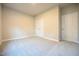 Spacious bedroom with double doors and closet at 400 S Eastwood Dr, Benson, NC 27504