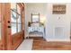 Light and bright entryway with a console table and hardwood floors at 997 Jackson Rd, Fuquay Varina, NC 27526