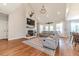 Bright living room with vaulted ceilings, sectional sofa, and fireplace at 997 Jackson Rd, Fuquay Varina, NC 27526