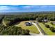 Aerial view of property showing home and outbuildings at 997 Jackson Rd, Fuquay Varina, NC 27526