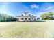 Stunning two-story farmhouse with a large front yard at 997 Jackson Rd, Fuquay Varina, NC 27526